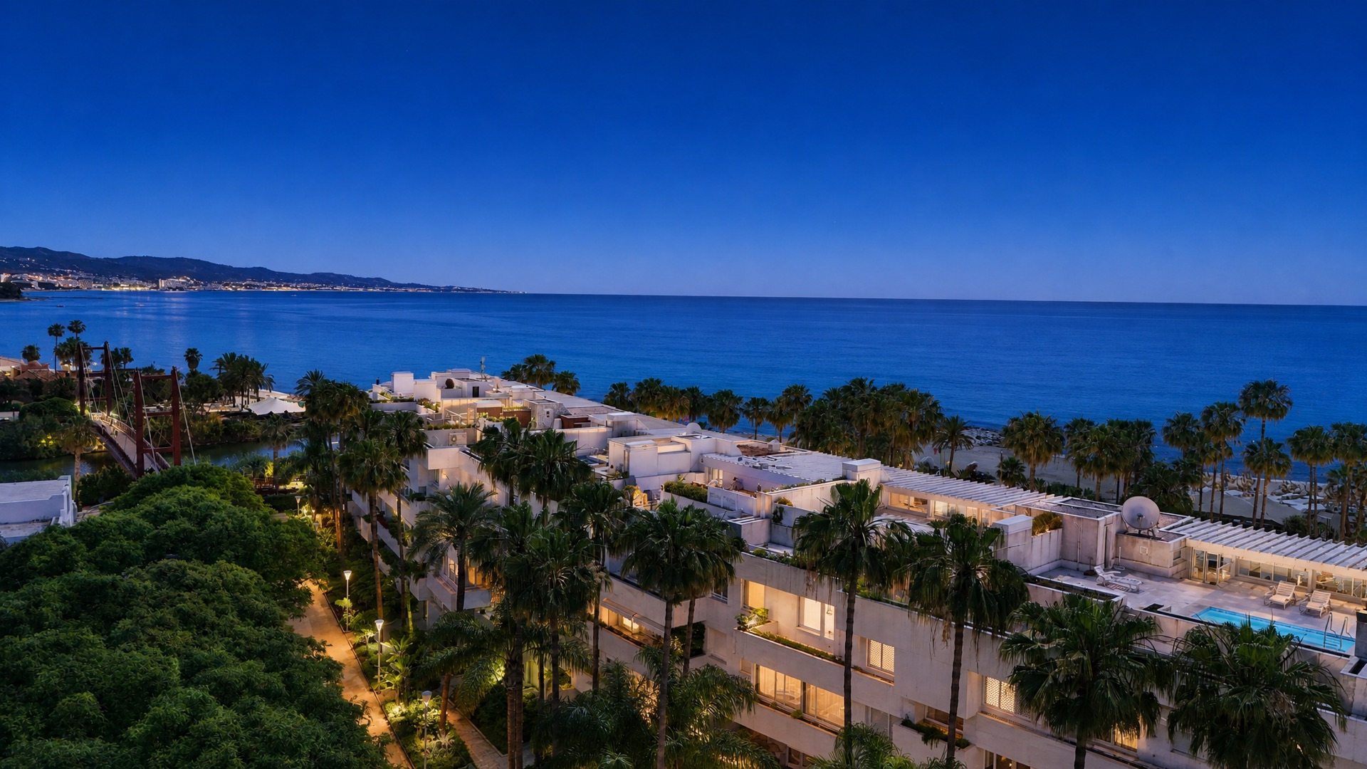 Coastal community dusk aerial at the La Isla penthouse