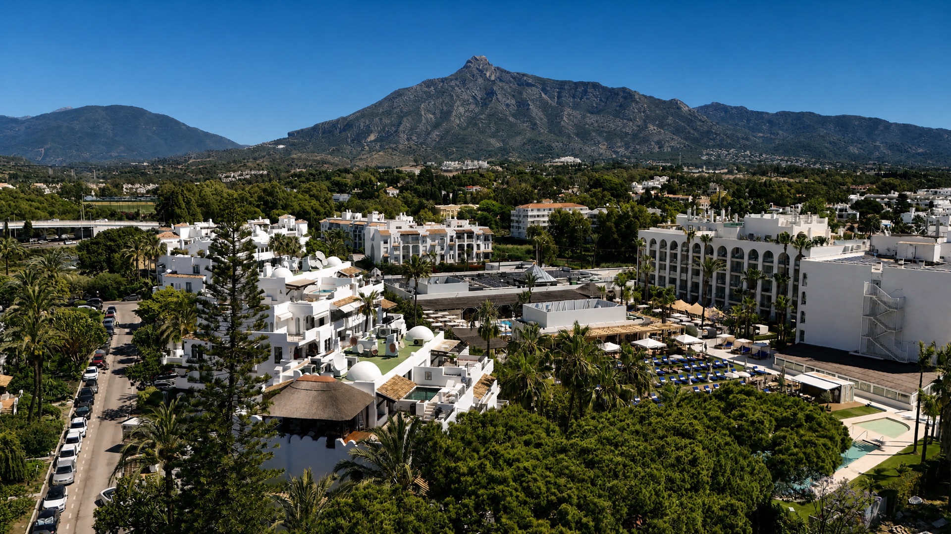 Aerial community pool mountain view at the La Isla penthouse
