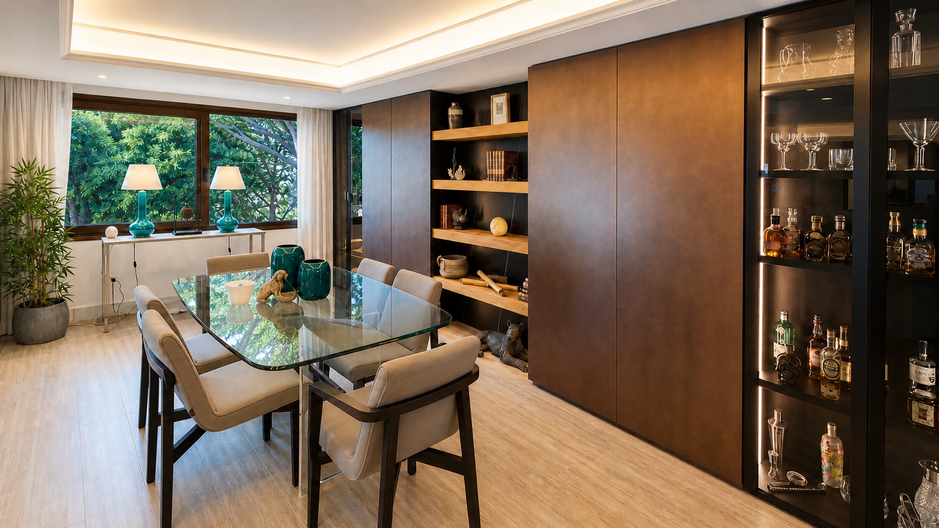 Dining room with glass table at the La Isla penthouse