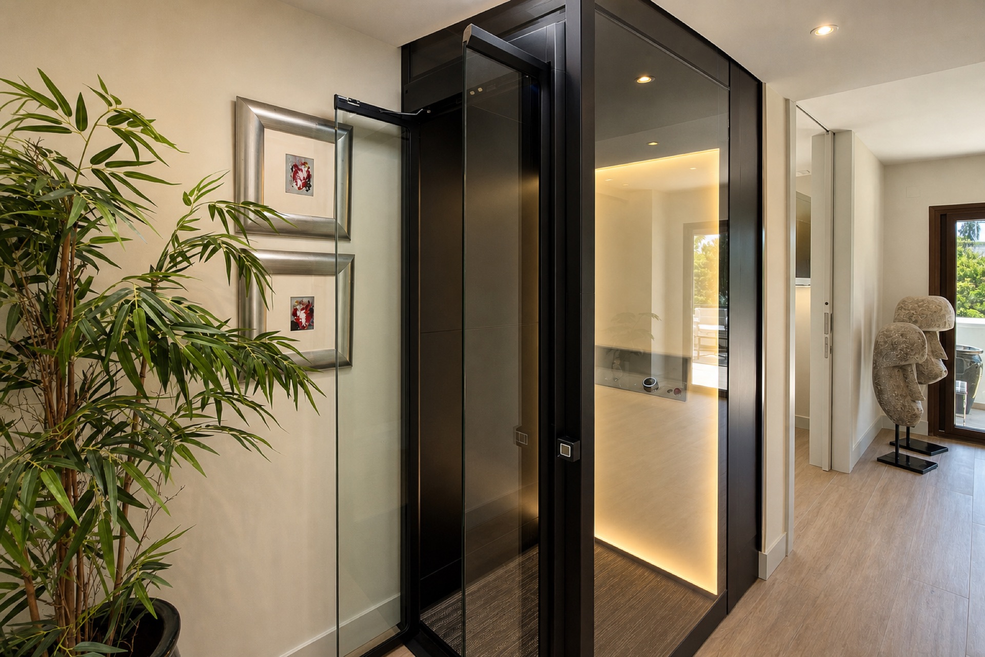 Modern home elevator in hallway at the La Isla penthouse