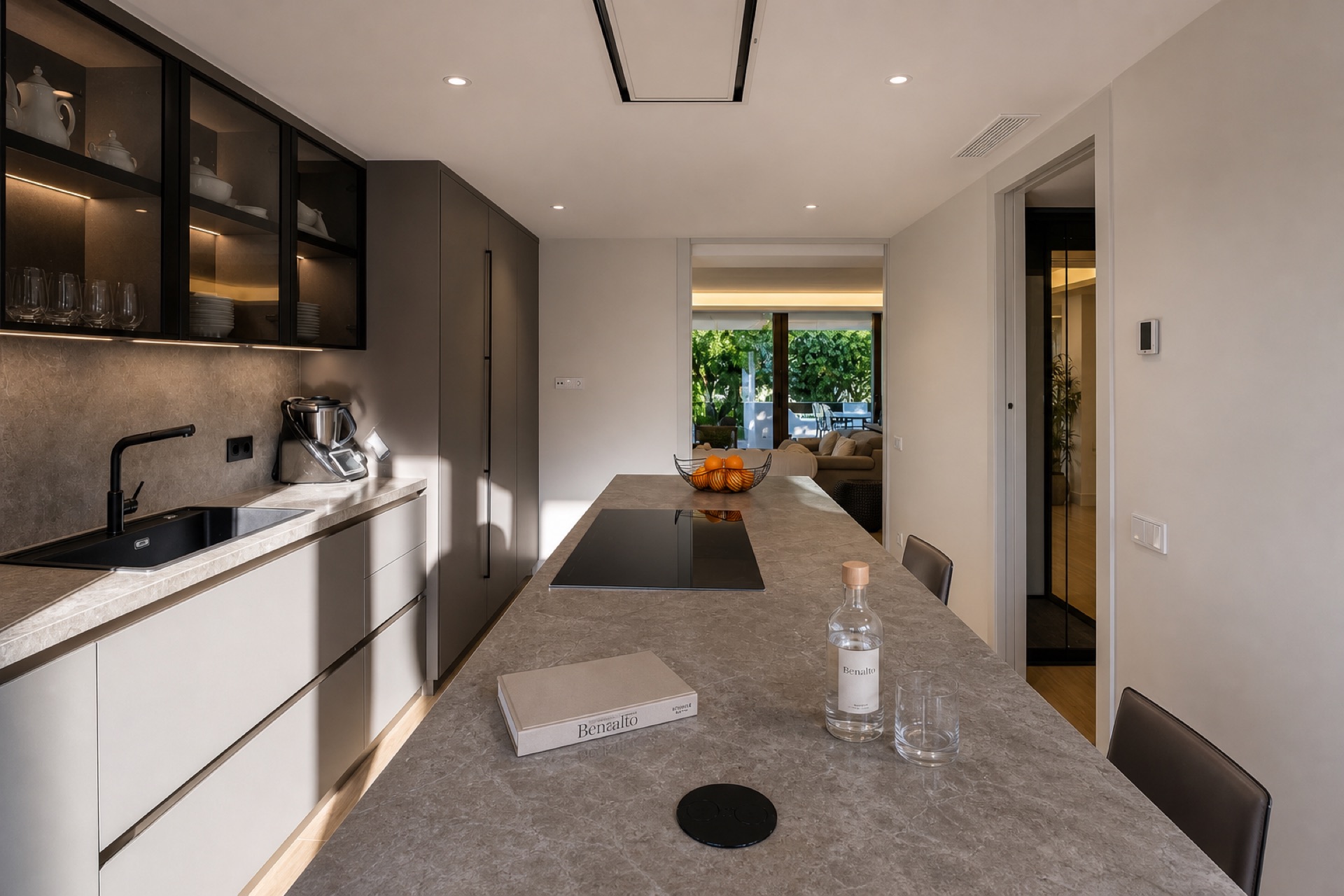 Modern kitchen with island at the La Isla penthouse