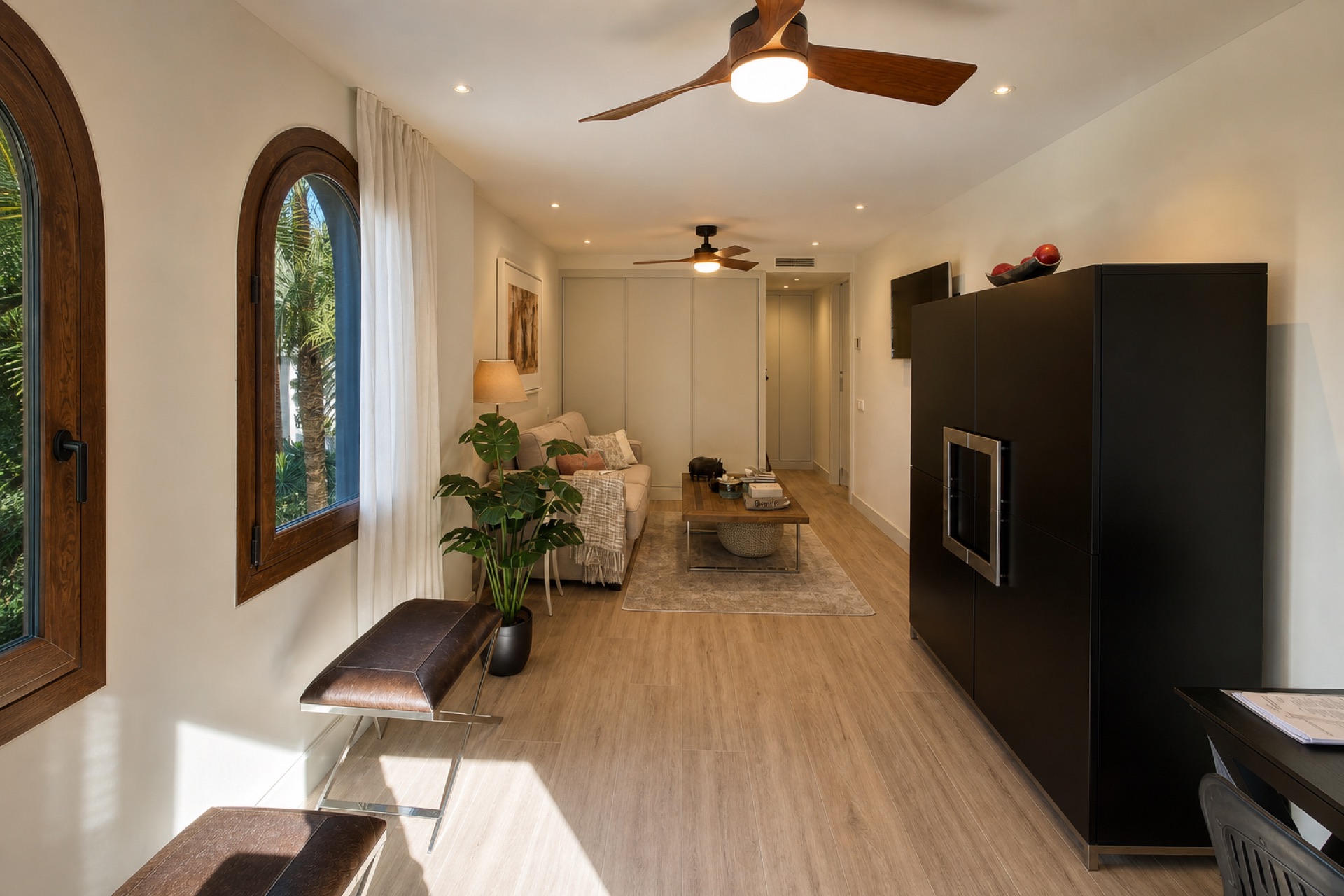 Bright living room arched windows at the La Isla penthouse