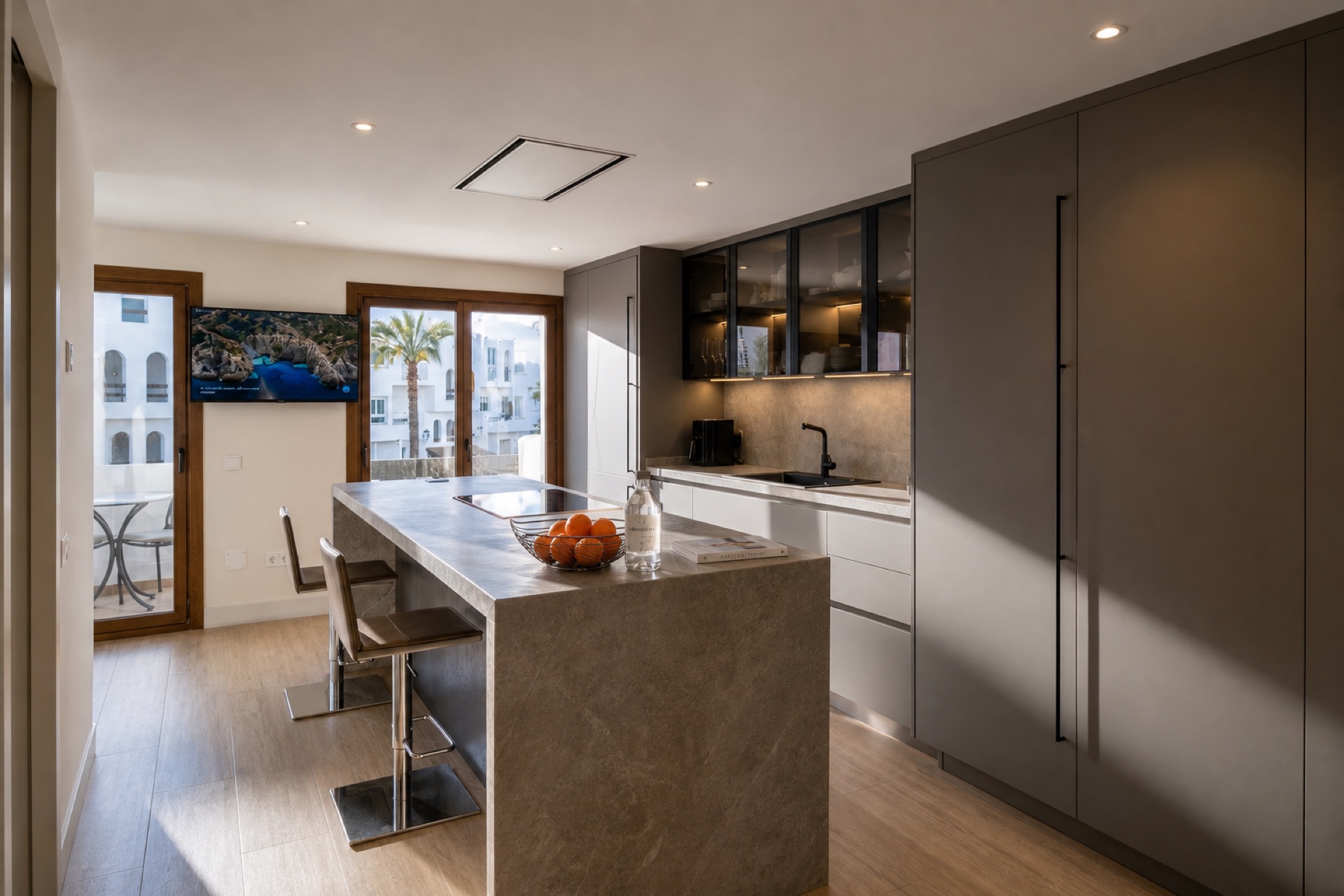 Modern kitchen with island at the La Isla penthouse