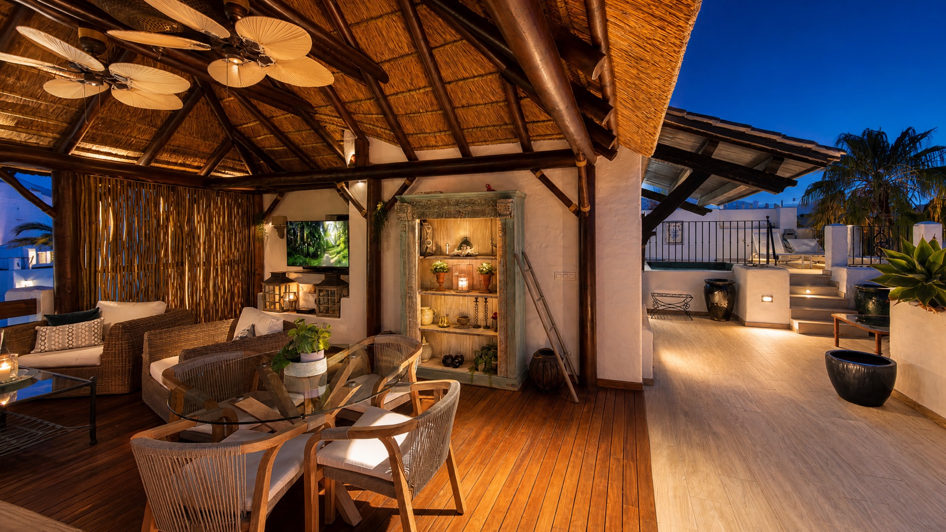 Covered terrace lounge dining at the La Isla penthouse