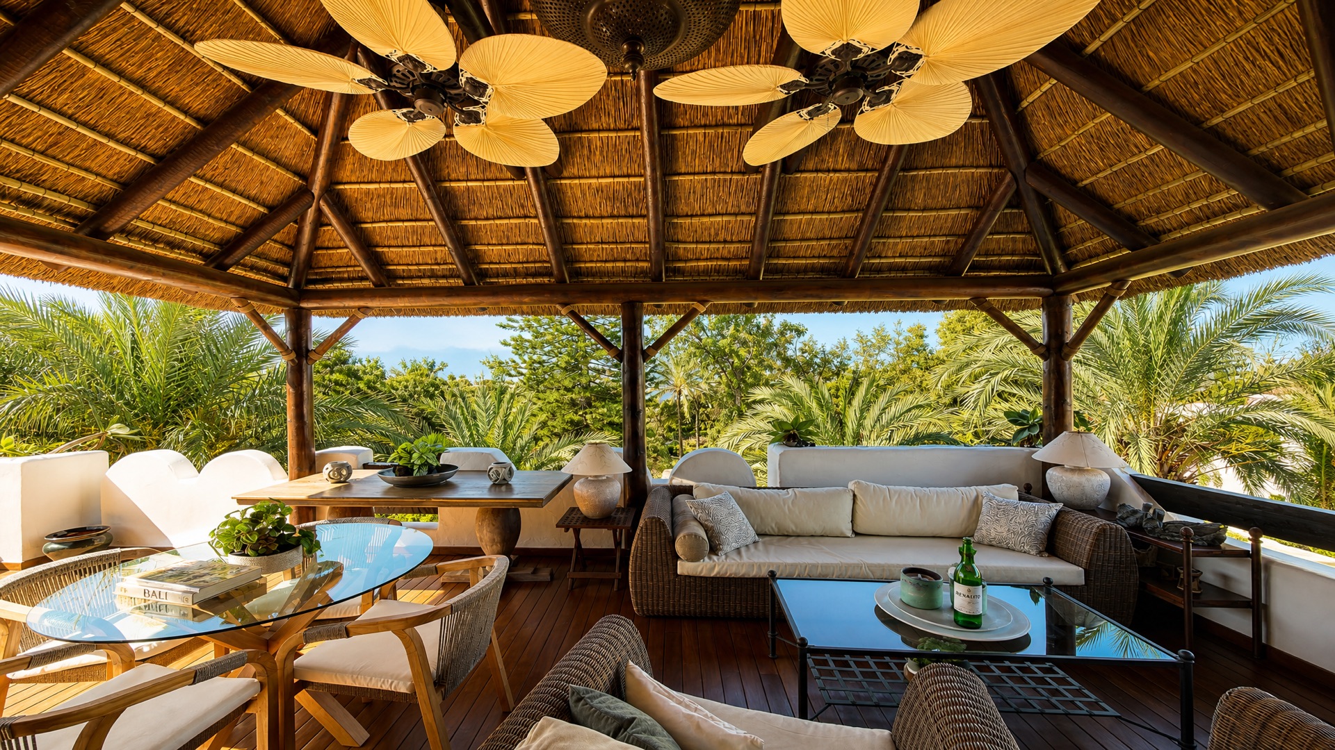 Covered terrace with lounge and dining at the La Isla penthouse