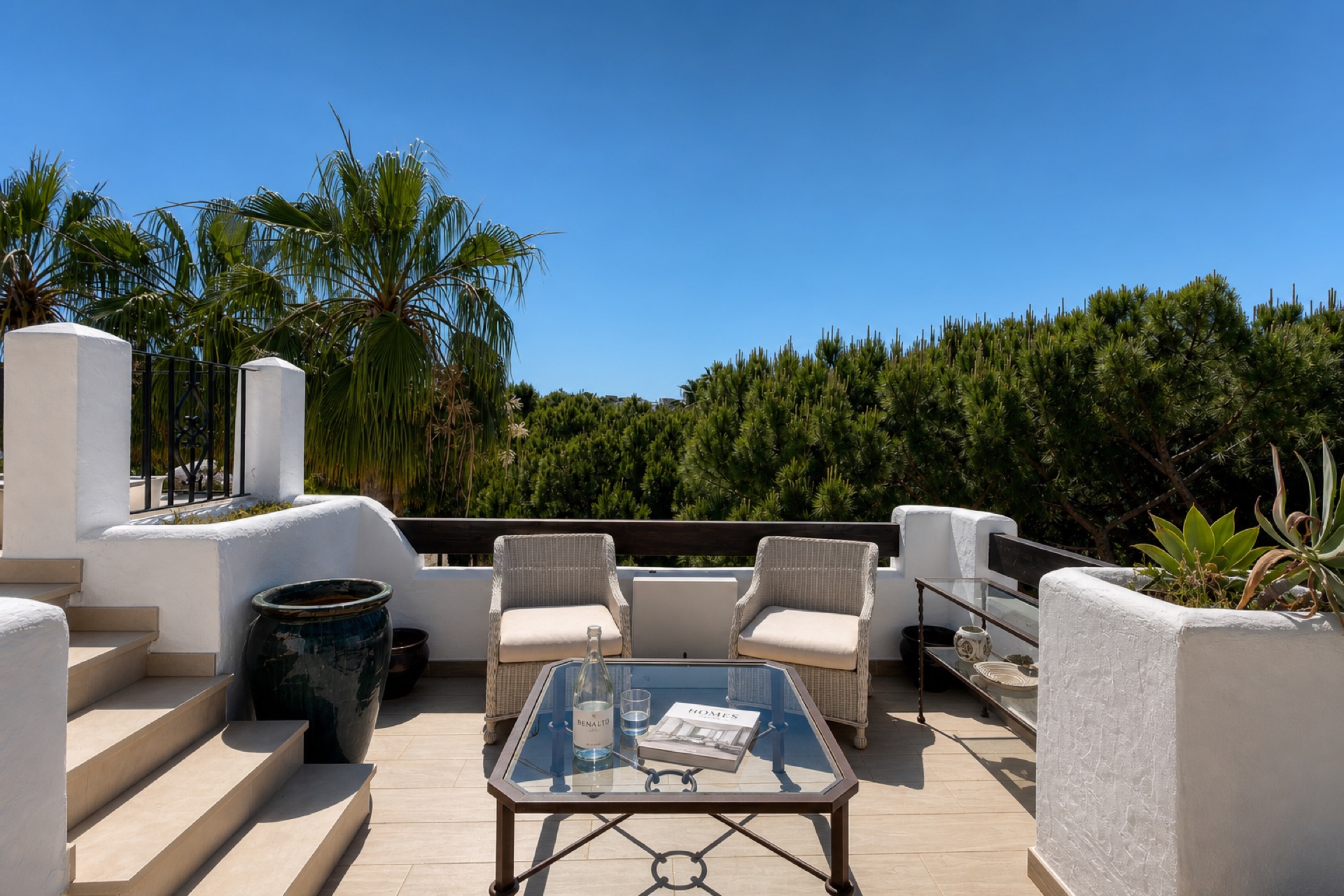 Private terrace with seating at the La Isla penthouse