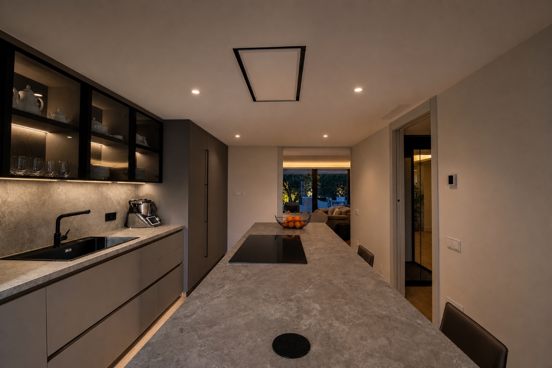 Modern kitchen with island at the La Isla penthouse