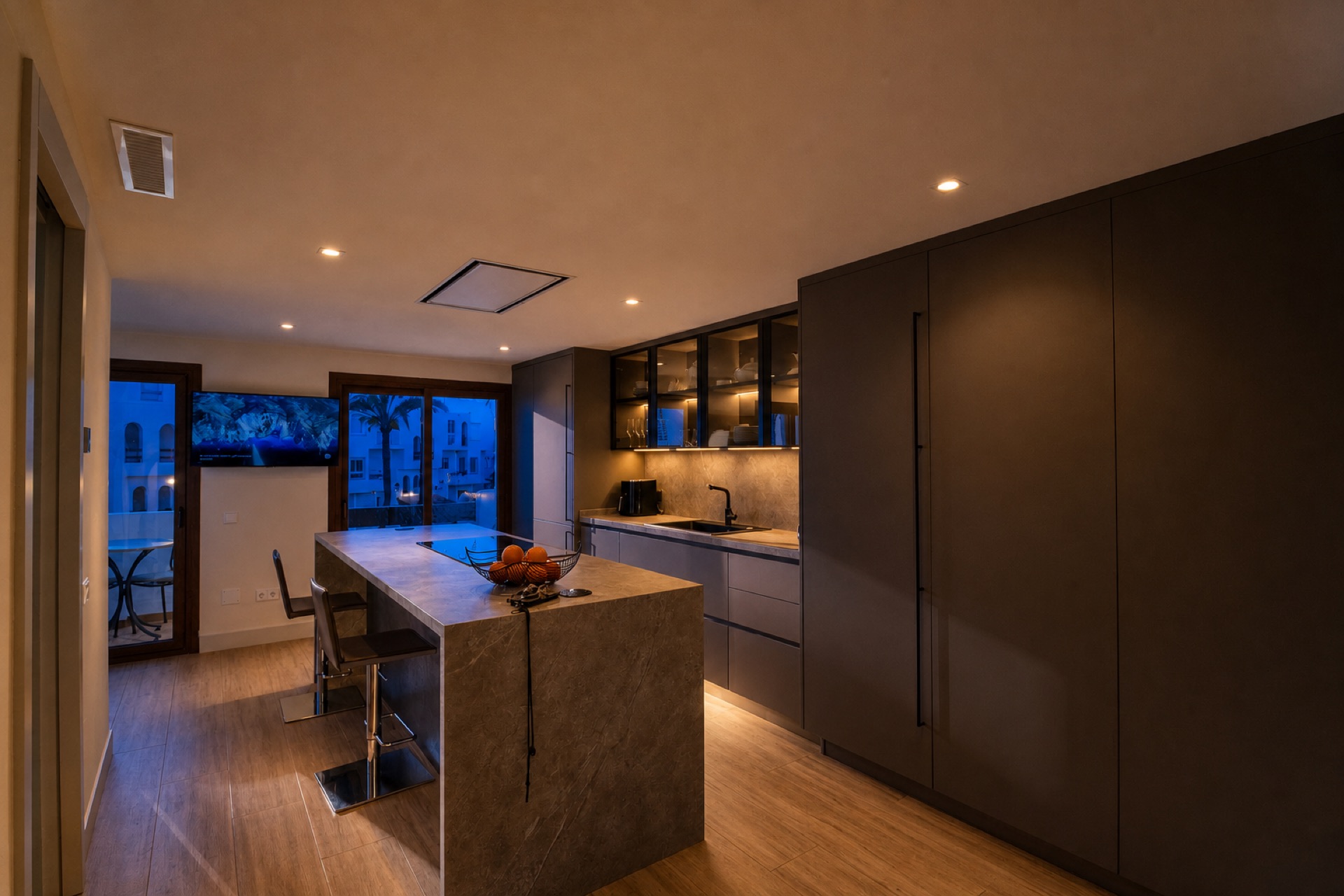 Modern kitchen with island at the La Isla penthouse