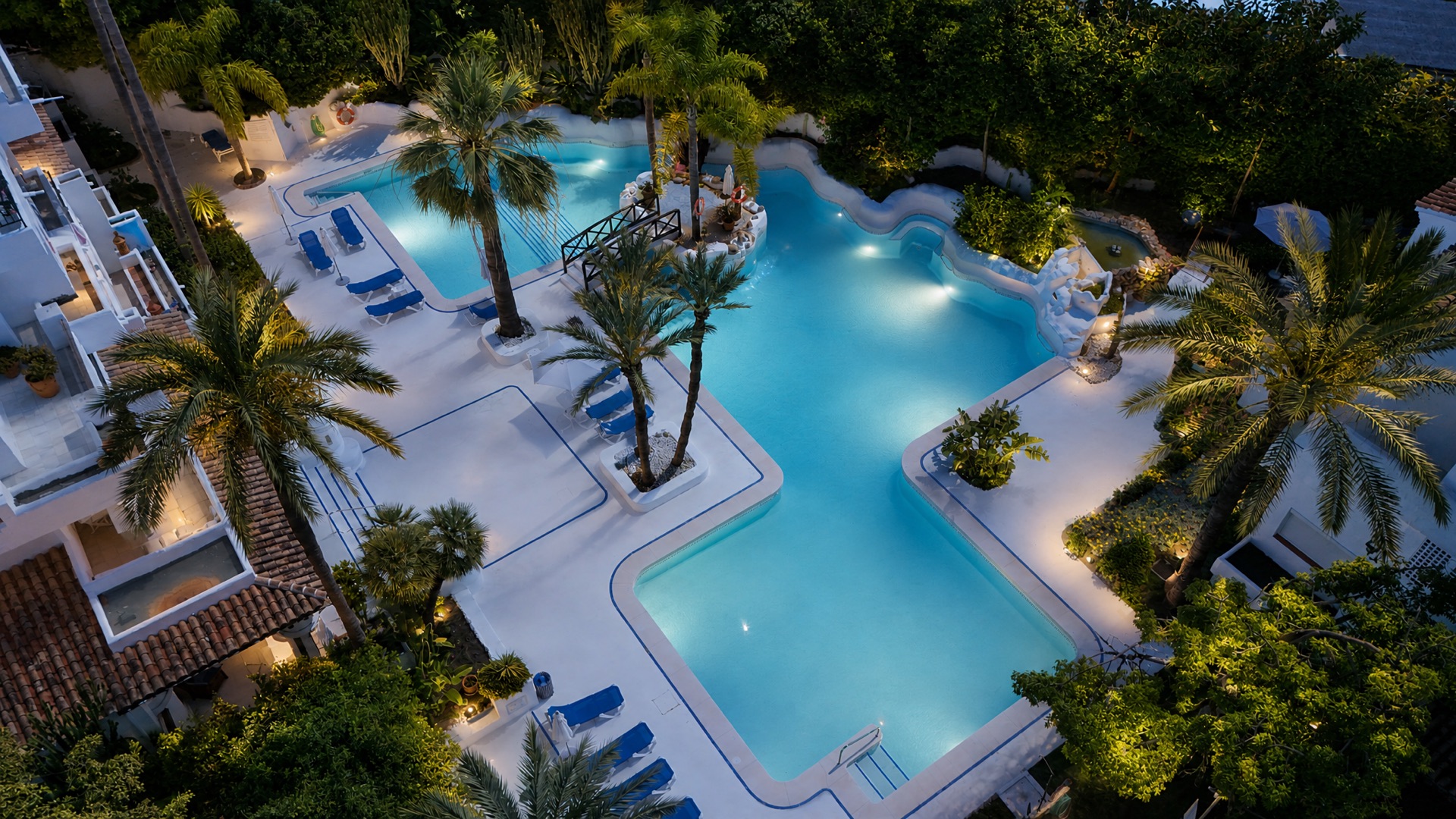 Communal pool evening aerial at the La Isla penthouse
